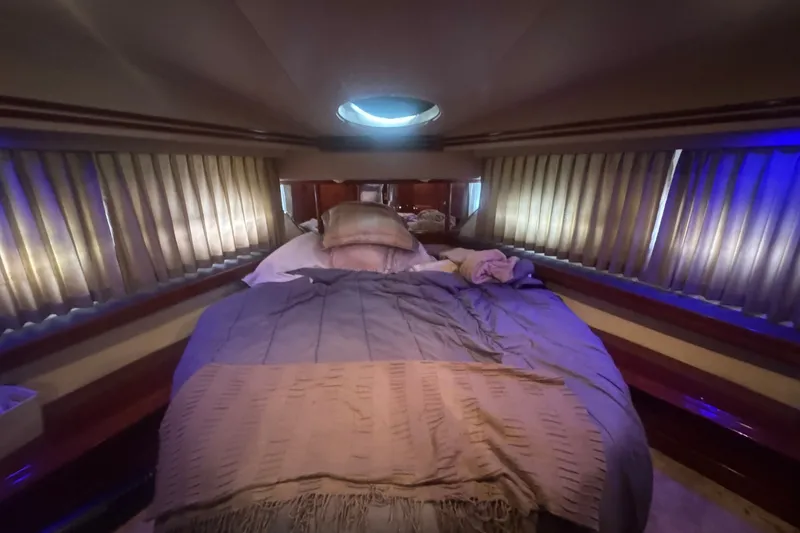 Slide: The Image of Luxurious bedroom interior of 2003 Carver 570 Voyager Pilothouse yacht. - 26