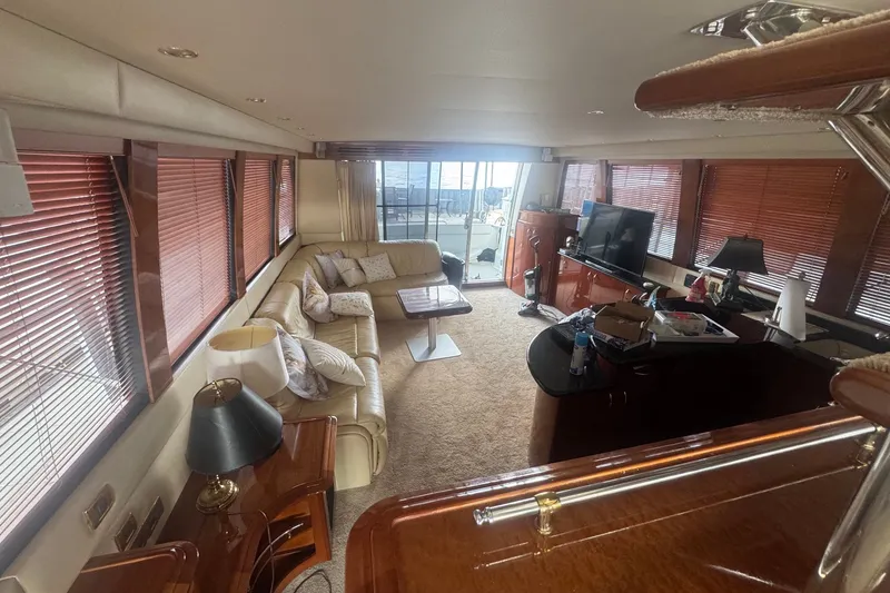 Slide: The Image of Luxurious interior of a 2003 Carver 570 Voyager Pilothouse yacht with elegant furnishings. - 19