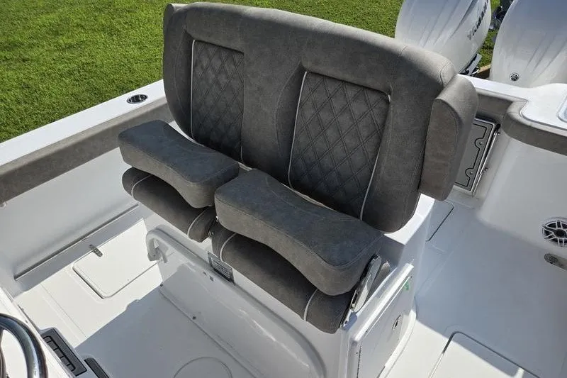 Slide: The Image of 2026 Sea Hunt Gamefish 25 boat seating with cushioned, diamond-stitched design. - 19