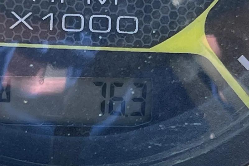 Slide: The Image of Close-up of a Sea Ray SPX 210 Outboard 2022 tachometer displaying 763 RPM. - 31