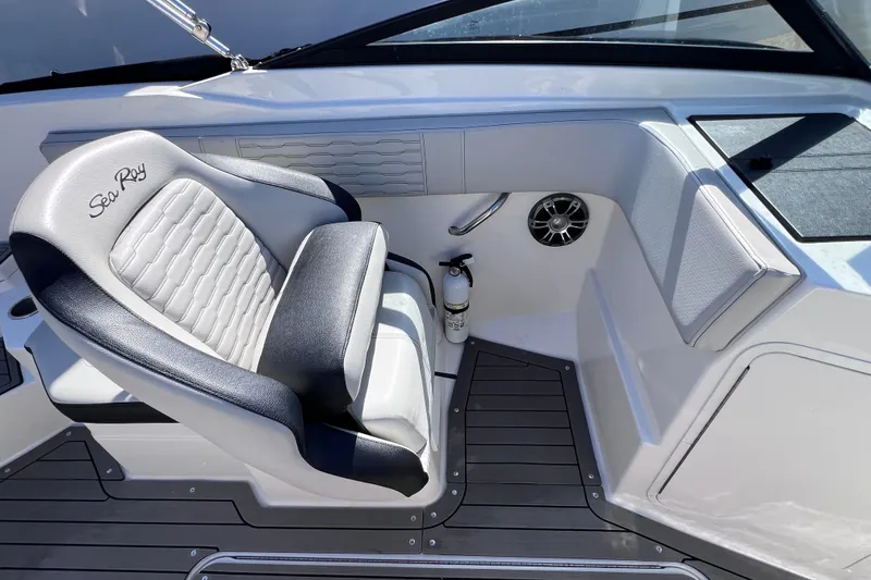 Slide: The Image of 2022 Sea Ray SPX 210 Outboard boat interior with luxury seating and modern design. - 18