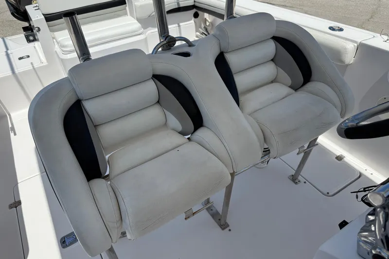 Slide: The Image of 2010 Donzi 32 ZF boat interior with dual cushioned seats. - 13