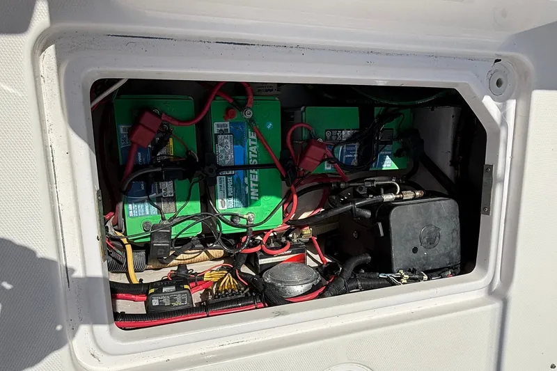 Slide: The Image of Battery compartment of a 2010 Donzi 32 ZF boat, featuring Interstate batteries. - 11