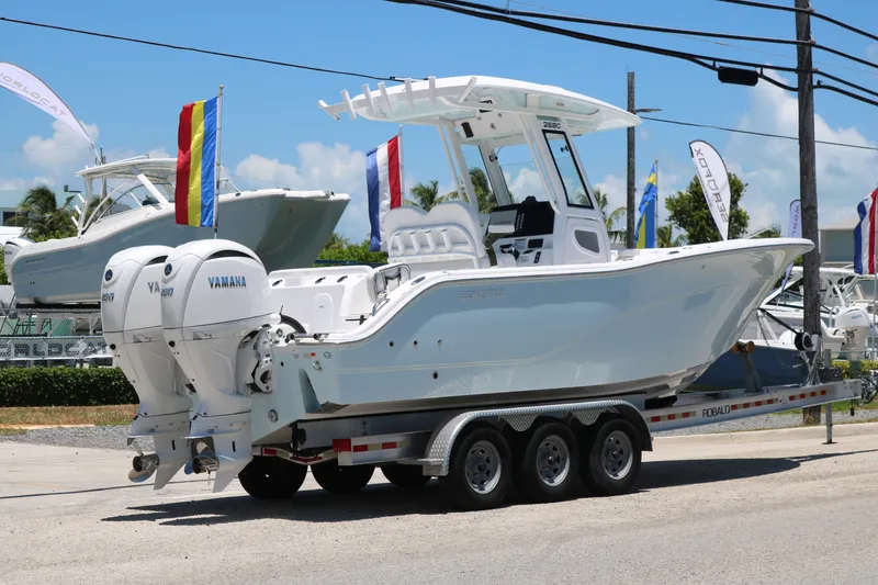 The Image of 2026 Sea Fox 268 Commander boat on trailer with dual Yamaha engines. - 0