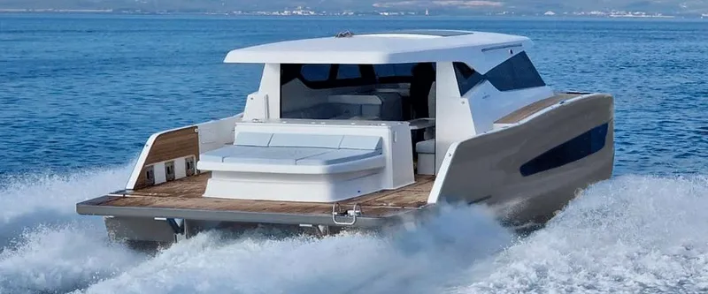 The Image of 2025 Aventura 38 Sport Coupe cruising on open water, showcasing sleek design and modern features. - 0