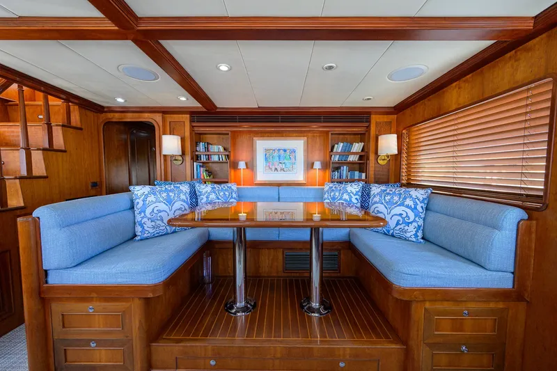 Slide: The Image of Luxurious interior of 2008 Outer Reef Yachts 800 Motoryacht with elegant wood and blue seating. - 14