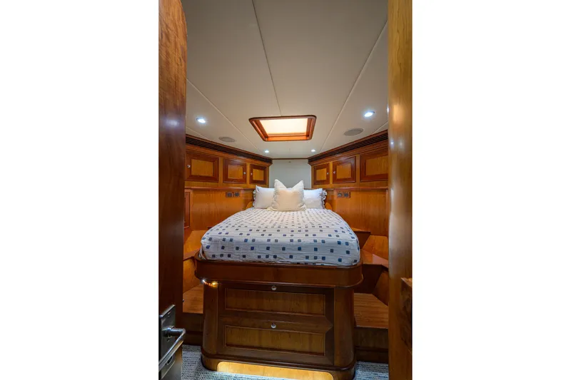 Slide: The Image of Luxurious cabin interior of 2008 Outer Reef Yachts 800 Motoryacht with elegant wood finish. - 17