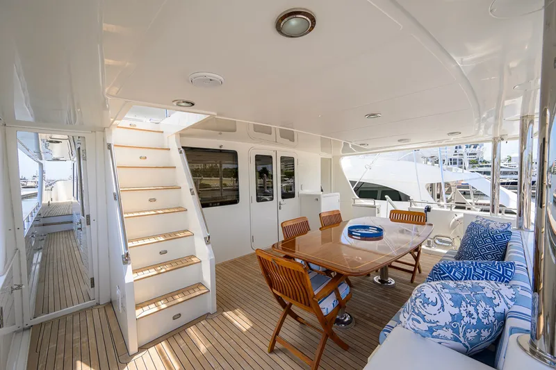 Slide: The Image of Luxurious 2008 Outer Reef Yachts 800 Motoryacht deck with elegant seating and dining area. - 34