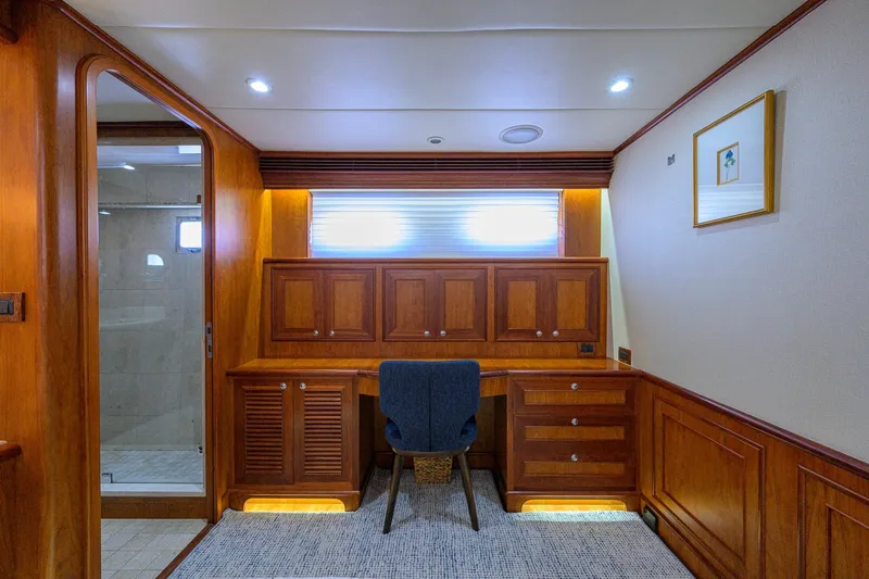 Slide: The Image of Luxurious wooden interior of 2008 Outer Reef Yachts 800 Motoryacht with desk and chair. - 21