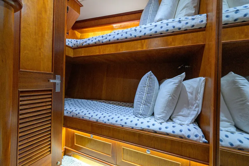 Slide: The Image of Bunk beds in 2008 Outer Reef Yachts 800 Motoryacht cabin with wooden finish. - 30