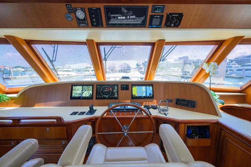 Slide: The Image of Luxurious helm of 2008 Outer Reef Yachts 800 Motoryacht with navigation displays. - 15