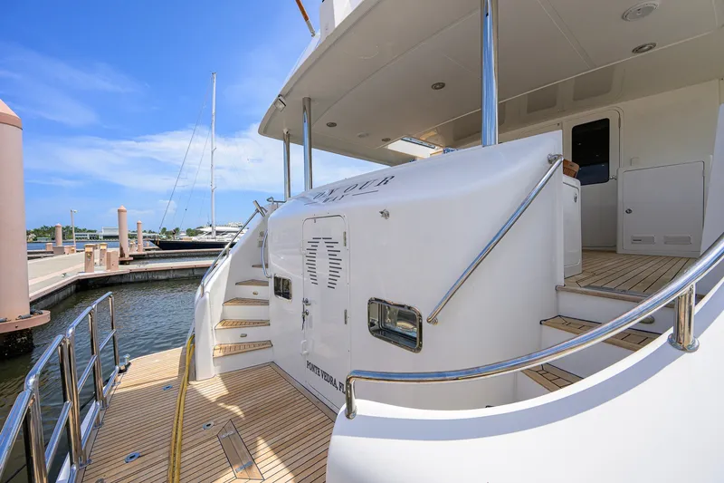 Slide: The Image of 2008 Outer Reef Yachts 800 Motoryacht docked, showcasing elegant deck and sleek design. - 33