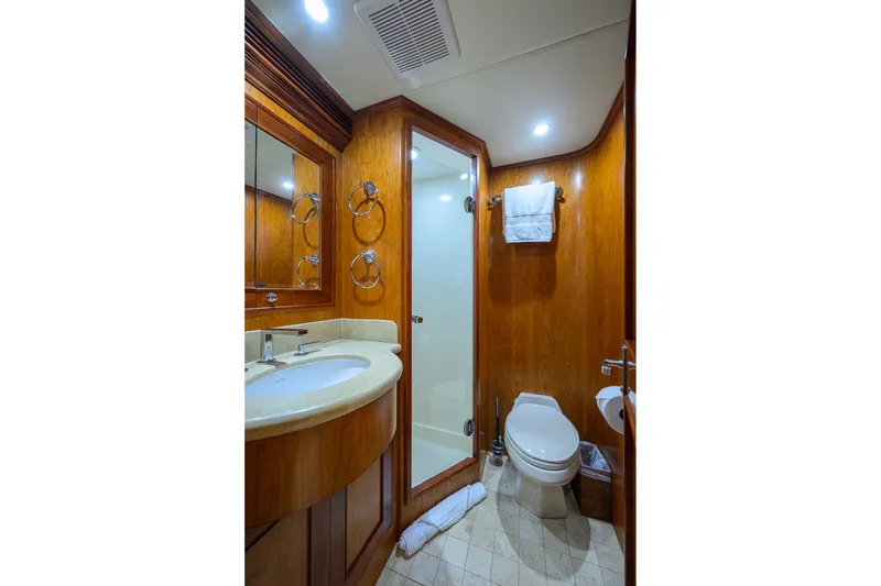 Slide: The Image of Luxurious bathroom in 2008 Outer Reef Yachts 800 Motoryacht with wood paneling and modern fixtures. - 19