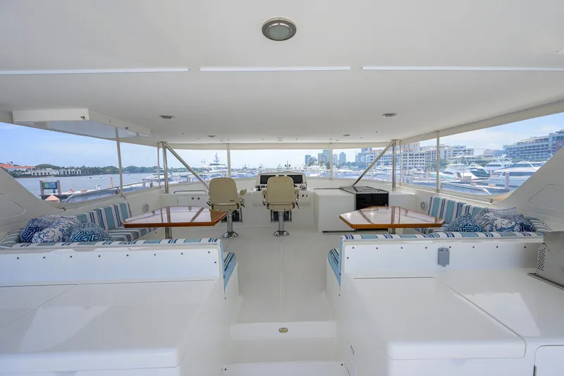 Slide: The Image of Luxurious 2008 Outer Reef Yachts 800 Motoryacht interior with seating and scenic marina view. - 38