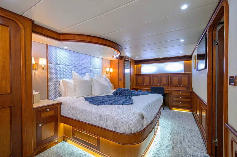 Slide: The Image of Luxurious bedroom interior of 2008 Outer Reef Yachts 800 Motoryacht with elegant wood finishes. - 20