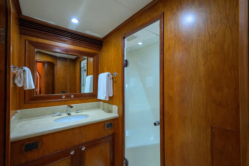 Slide: The Image of Luxurious bathroom interior of 2008 Outer Reef Yachts 800 Motoryacht with wood finish. - 28