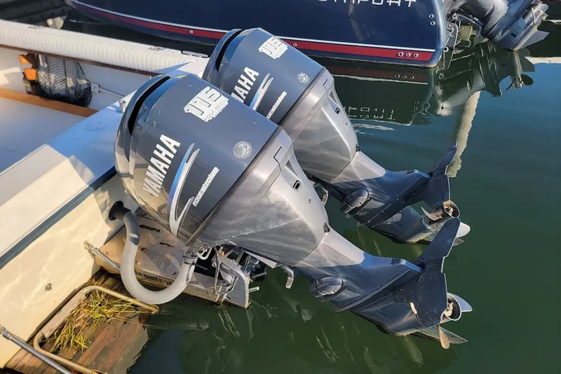 Slide: The Image of Twin Yamaha outboard motors on a 1985 Grady-White Offshore Pro 247 boat. - 1