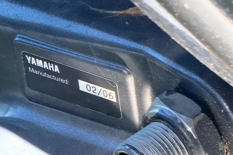 Slide: The Image of Yamaha engine label showing manufacture date, February 2006, on Grady-White Offshore Pro 247. - 9