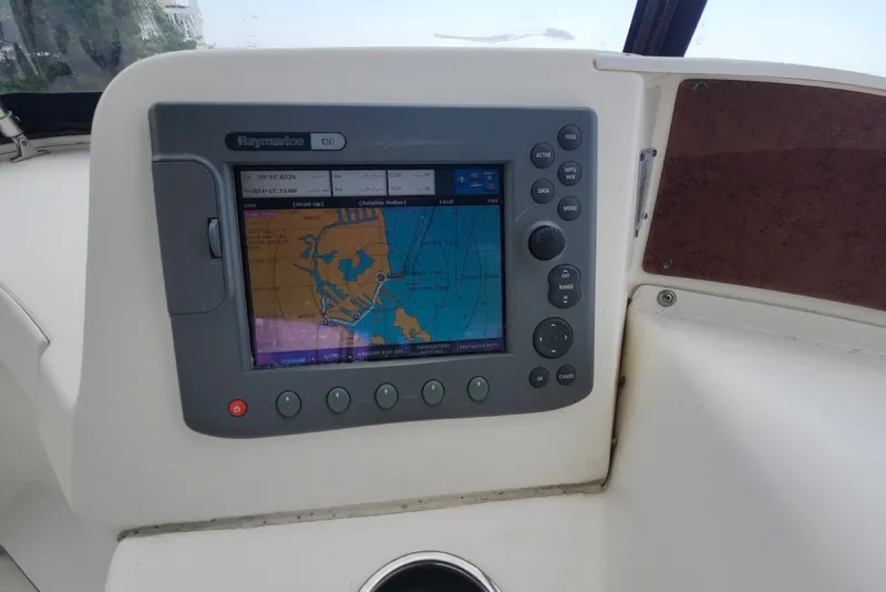 Slide: The Image of Raymarine navigation system on 2008 Silverton 36 Convertible boat dashboard. - 17
