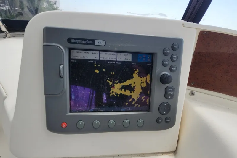 Slide: The Image of Raymarine C80 navigation display on 2008 Silverton 36 Convertible boat dashboard. - 16