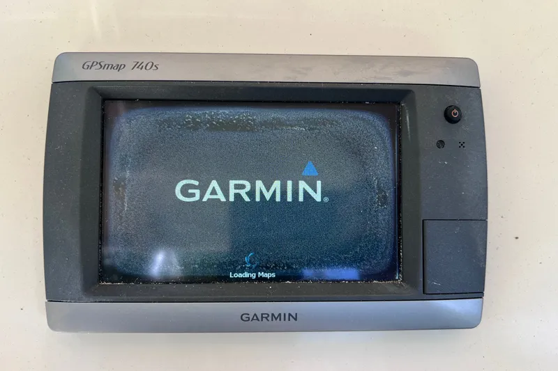 Slide: The Image of Garmin GPSmap 740s device displaying loading screen on Scout 210 XSF, 2012 model. - 31