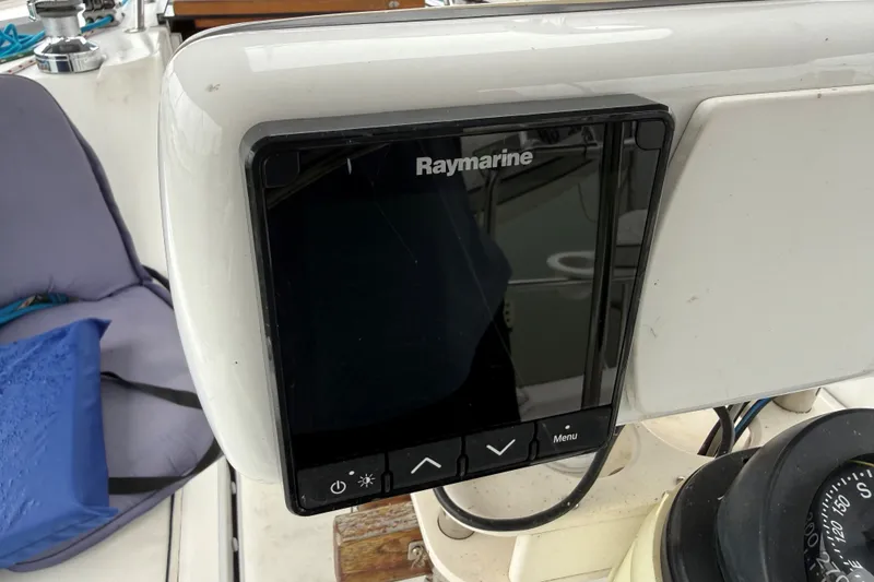 Slide: The Image of Raymarine navigation system on 1996 Hunter Legend 37.5 sailboat cockpit. - 7