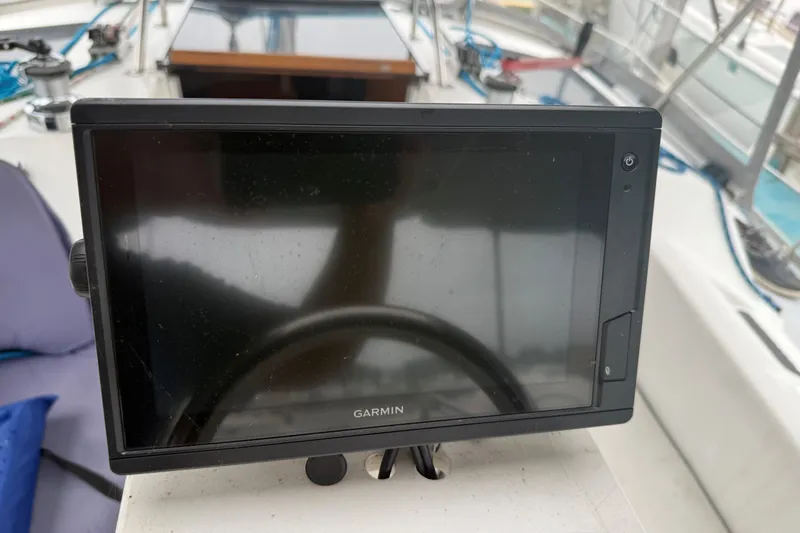 Slide: The Image of Garmin navigation device on 1996 Hunter Legend 37.5 sailboat cockpit. - 9