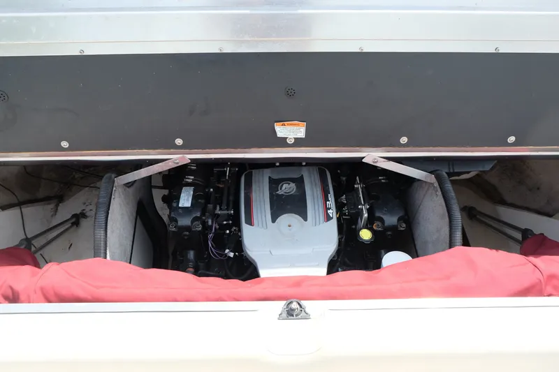 Slide: The Image of Engine compartment of a 2009 Bryant 190 boat, featuring a 4.3L engine. - 17
