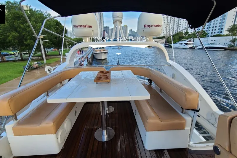 Slide: The Image of Luxurious 2010 Aicon 58 yacht with elegant seating and waterfront view. - 13