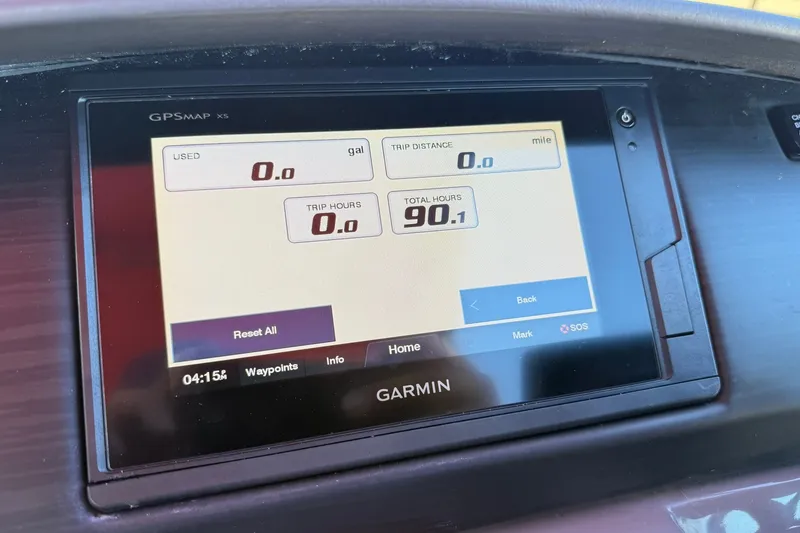 Slide: The Image of Garmin GPS display on 2020 Bennington SXP 25 SSBXP showing trip data. - 19