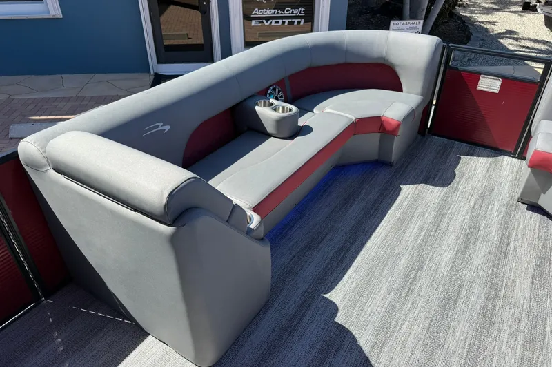 Slide: The Image of 2020 Bennington SXP 25 SSBXP pontoon boat interior with gray and red seating. - 28