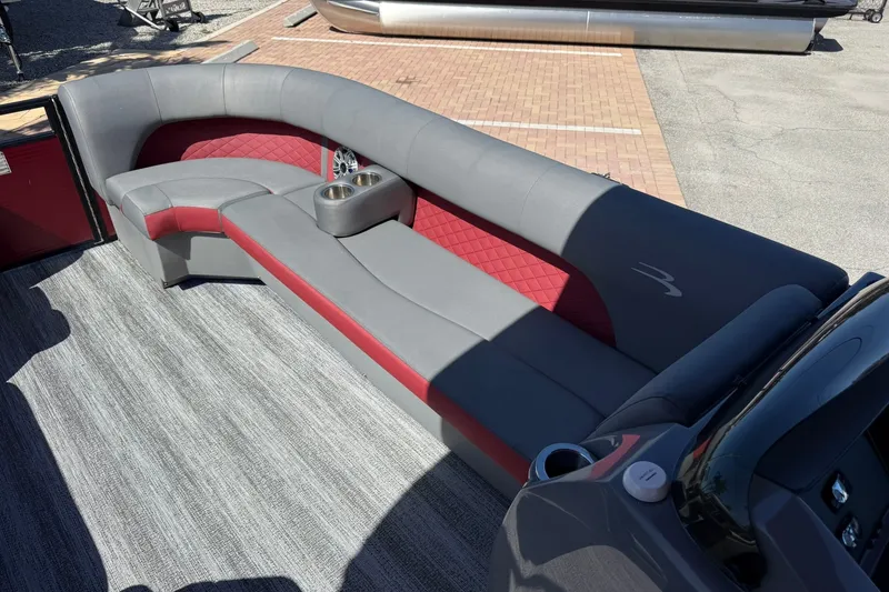 Slide: The Image of 2020 Bennington SXP 25 SSBXP pontoon boat with gray and red seating, cup holders. - 29