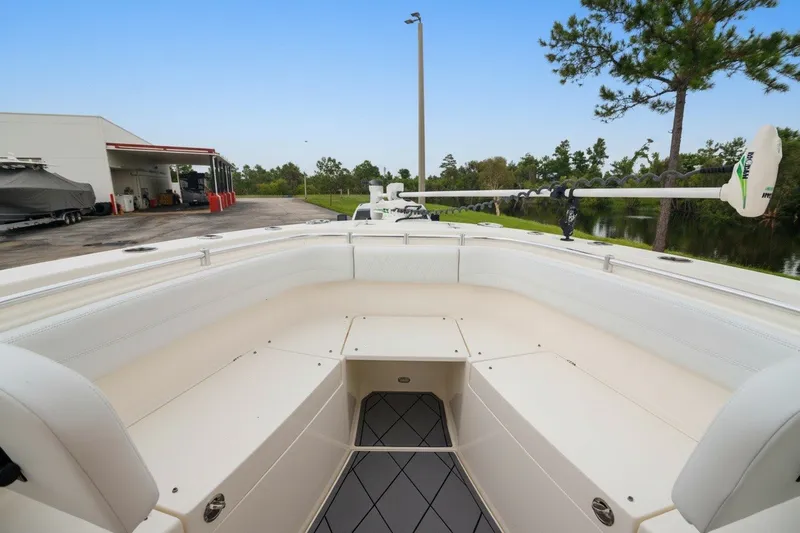 Slide: The Image of 2021 Cobia 280 Center Console boat interior with spacious seating and modern design. - 14
