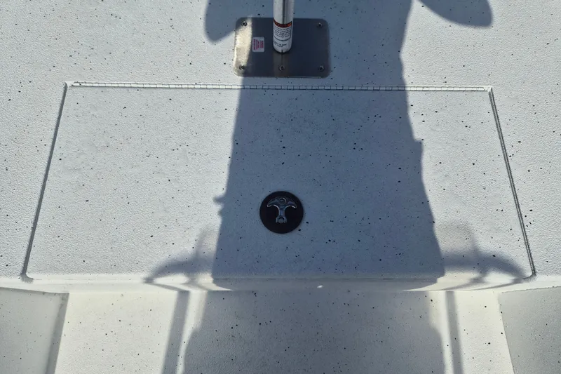 Slide: The Image of 2027 Xpress H20 Bay boat deck with shadow and mounted pole. - 25