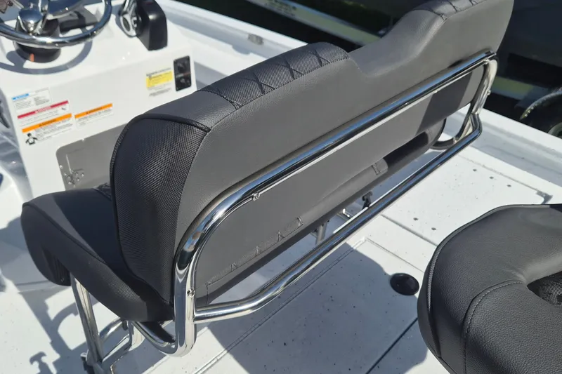 Slide: The Image of 2027 Xpress H20 Bay boat interior with sleek seating and chrome accents. - 6