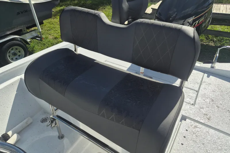 Slide: The Image of 2027 Xpress H20 Bay boat seat with diamond-stitched upholstery, showcasing modern design and comfort. - 7