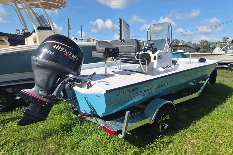 Slide: The Image of 2027 Xpress H20 Bay boat with Yamaha SHO VMAX engine on trailer. - 2