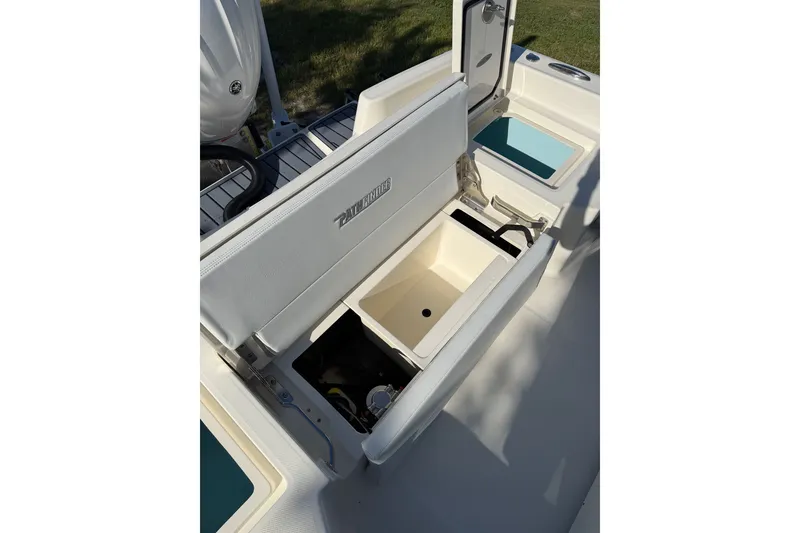 Slide: The Image of 2025 Pathfinder 2400 TRS boat interior with open storage compartments. - 17