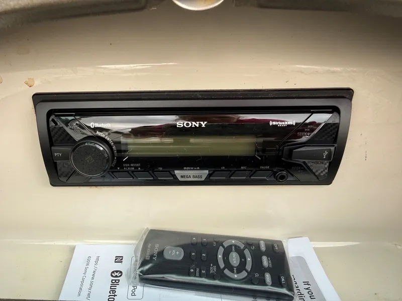 Slide: The Image of Sony car stereo with remote control in a Sea Ray 200 Sport boat. - 20