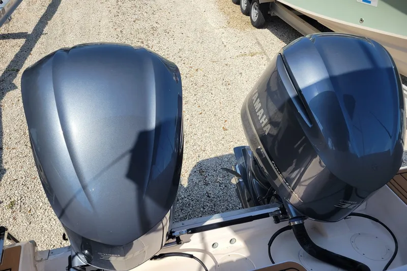 Slide: The Image of Twin Yamaha outboard engines on a 2005 Grady-White Express 330 boat. - 5