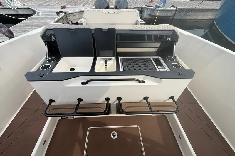 Slide: The Image of Outdoor kitchen setup on 2025 Navan S30 boat, featuring sink and grill. - 11