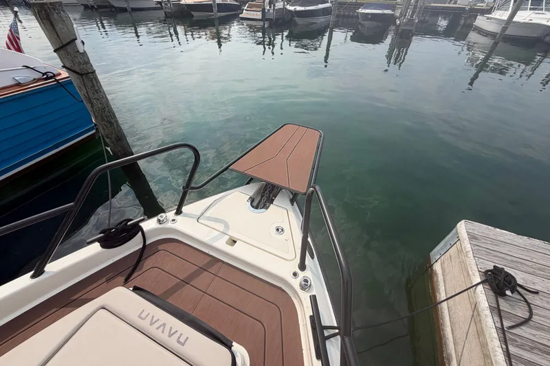 Slide: The Image of Bow view of 2025 Navan S30 boat docked at marina. - 15