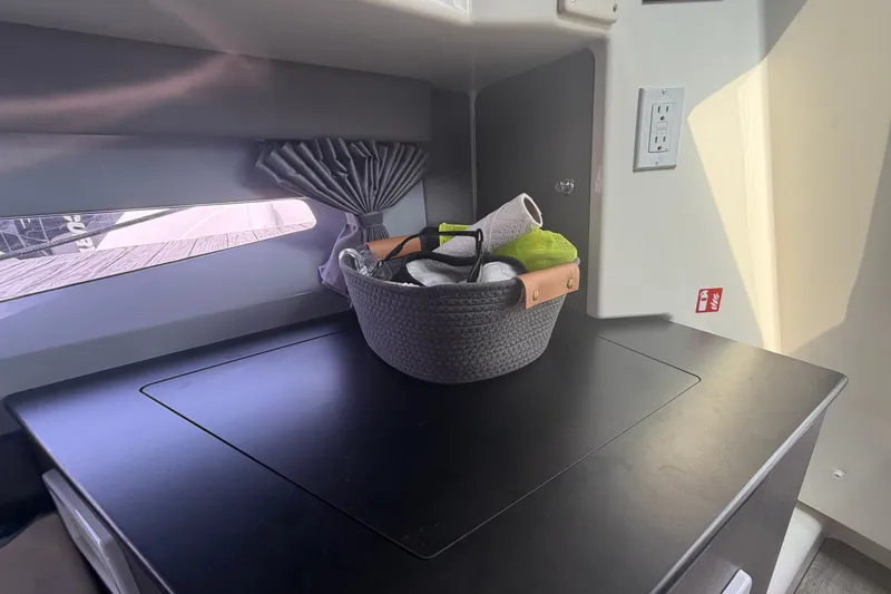 Slide: The Image of Interior of 2025 Navan S30 with basket on counter, modern design. - 22