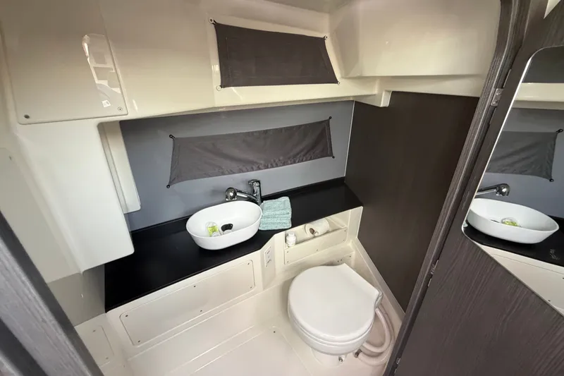 Slide: The Image of Modern bathroom in 2025 Navan S30 boat with sleek sink and compact toilet. - 26