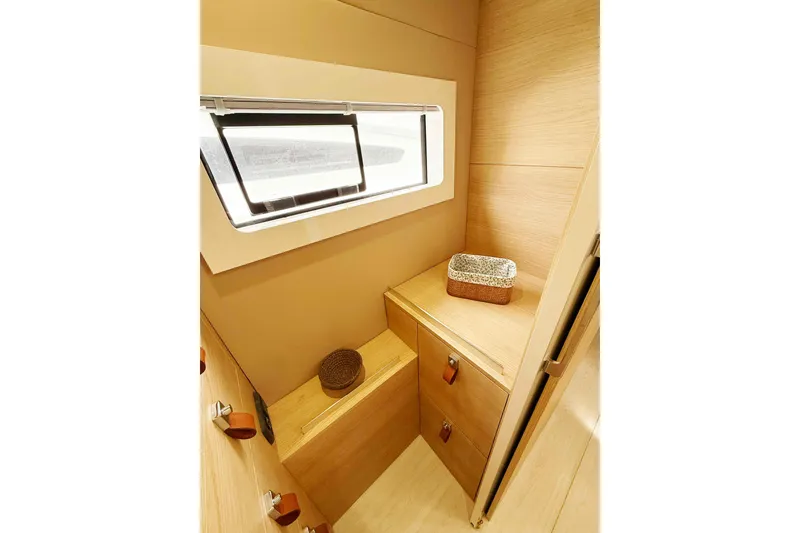 Slide: The Image of Interior of 2026 Aventura 37 Explorer Trawler with wooden cabinetry and window. - 31