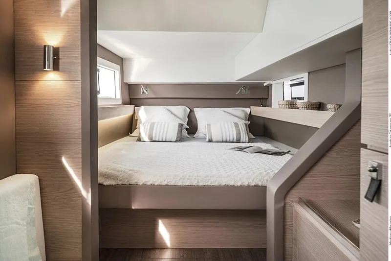 Slide: The Image of Luxurious interior of 2025 Aventura 37 Trawler with cozy bed and modern design. - 11