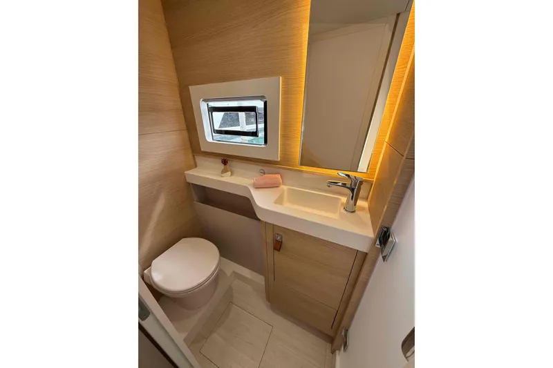Slide: The Image of Modern bathroom in 2026 Aventura 37 Explorer Trawler with sleek fixtures and ambient lighting. - 14