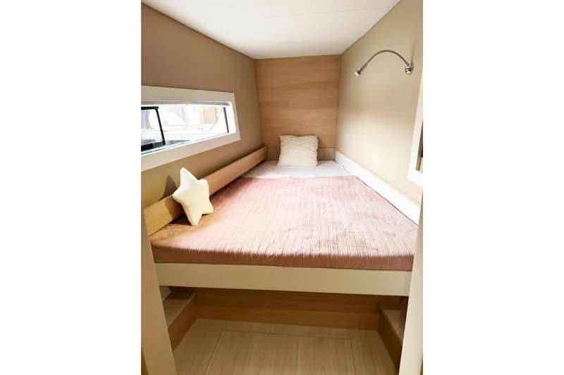 Slide: The Image of Cozy bedroom interior of 2026 Aventura 37 Explorer Trawler with modern design and window view. - 29