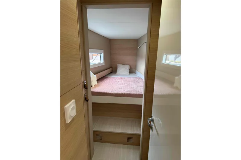 Slide: The Image of Cozy cabin interior of 2026 Aventura 37 Explorer Trawler with bed and window. - 15