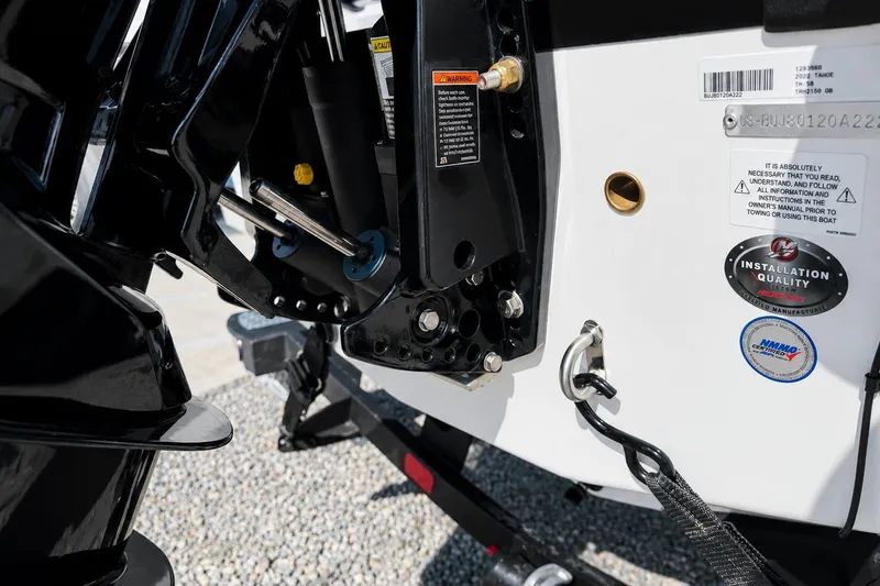 Slide: The Image of Close-up of 2022 Tahoe 2150 boat engine mount with installation quality labels. - 40